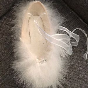 Decorative fur covered ballet pointe shoe